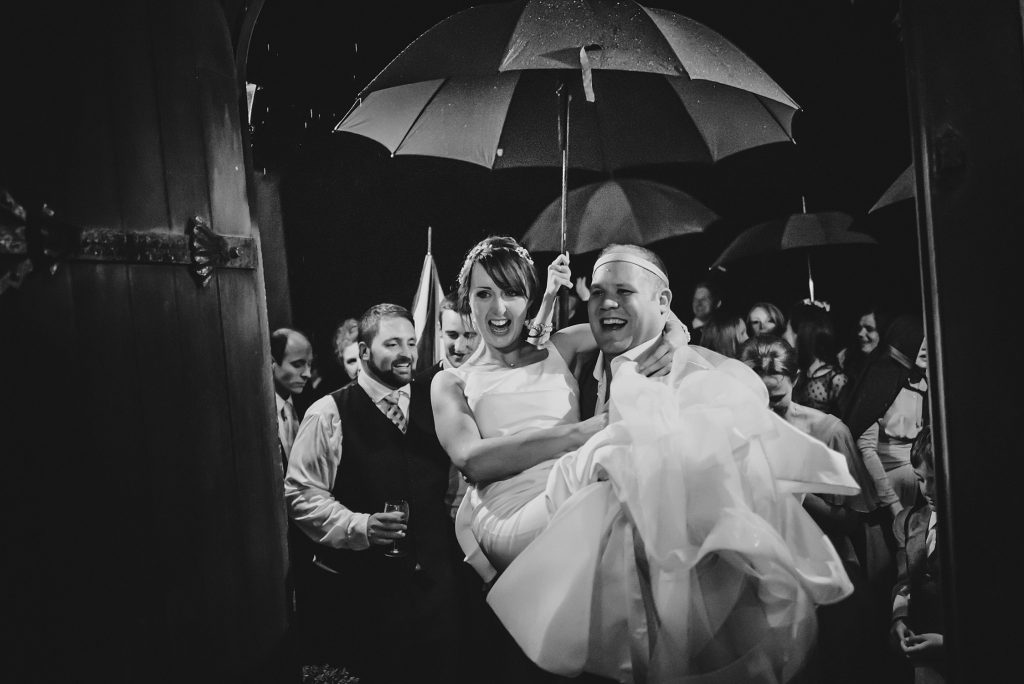 fun rainy wedding photos cornwall