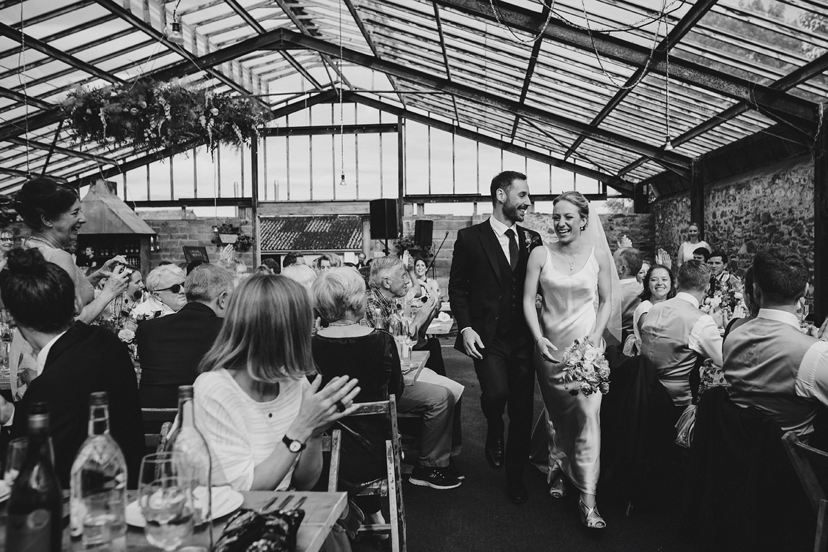 Bride and groom announced into wedding breakfast