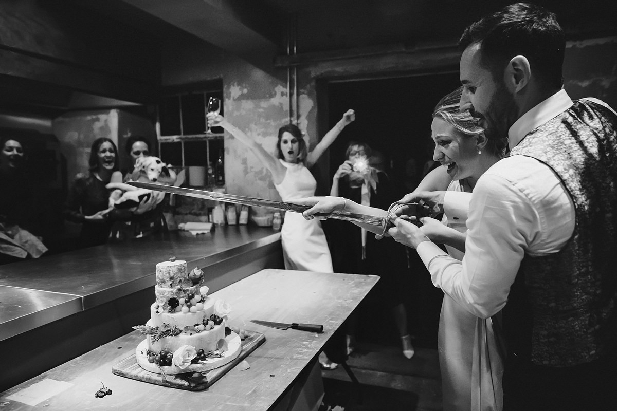 Cate cutting at an Anran wedding