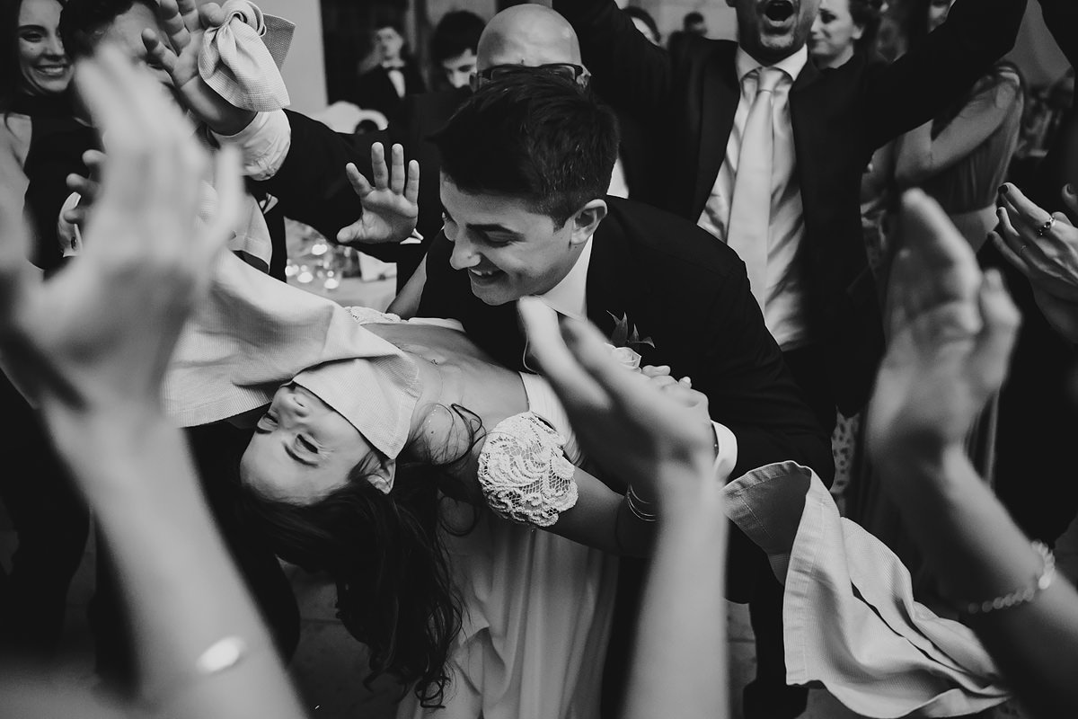 Bride and groom first dance black and white photo