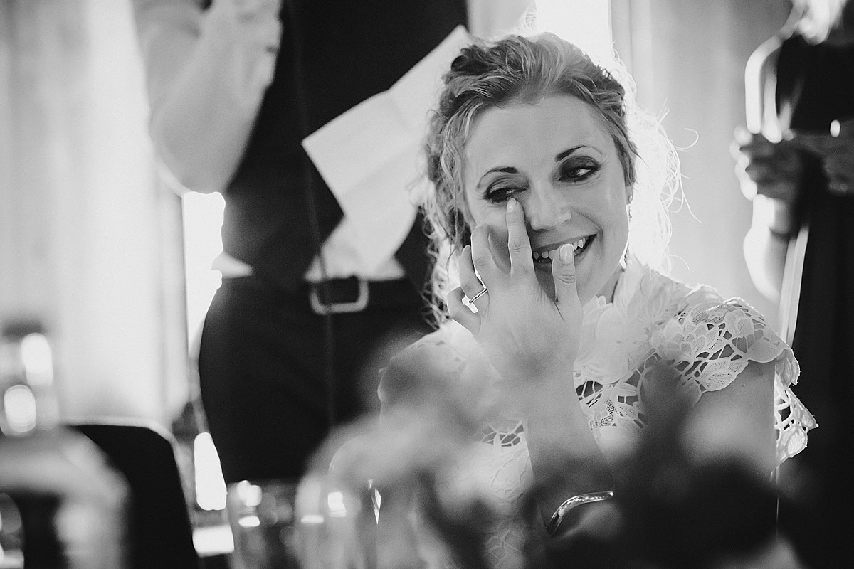 Emotional bride during speeches