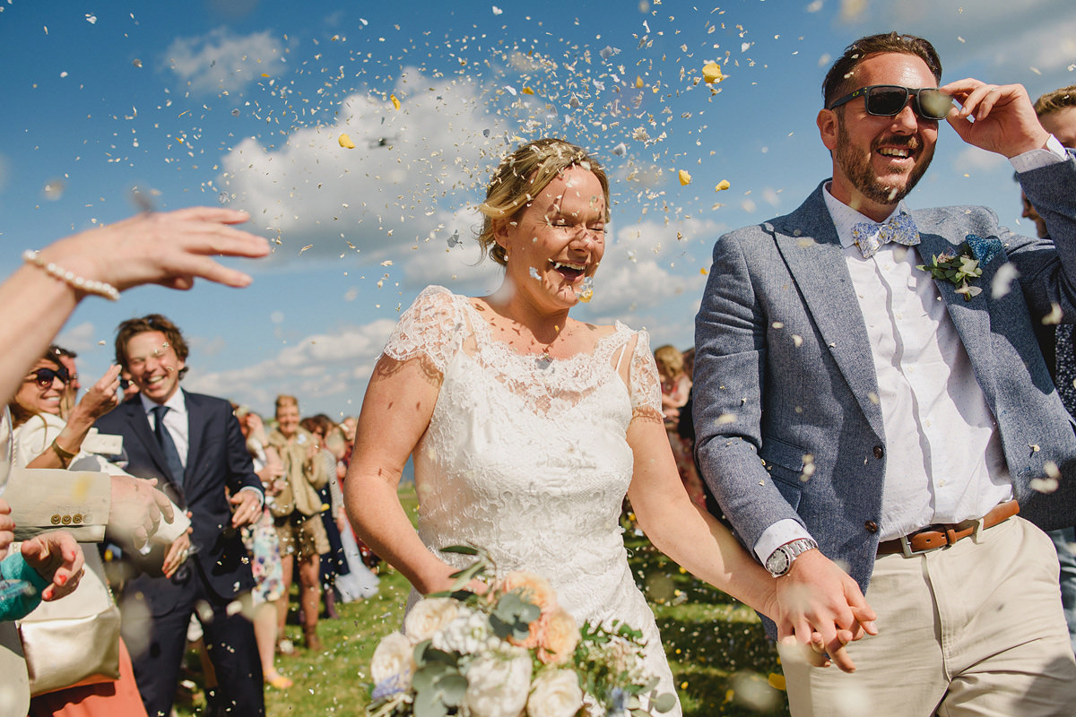 Bride and groom confetti photo
