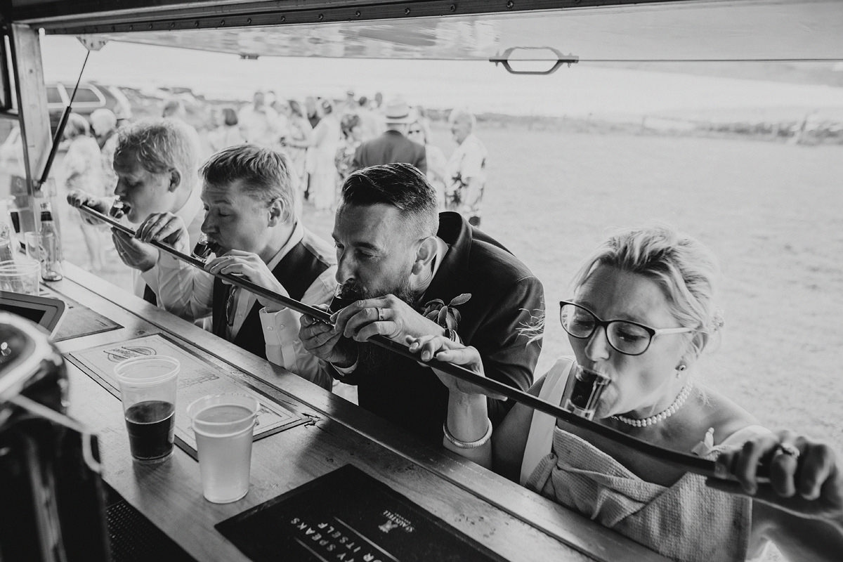 wedding guests drinking shots