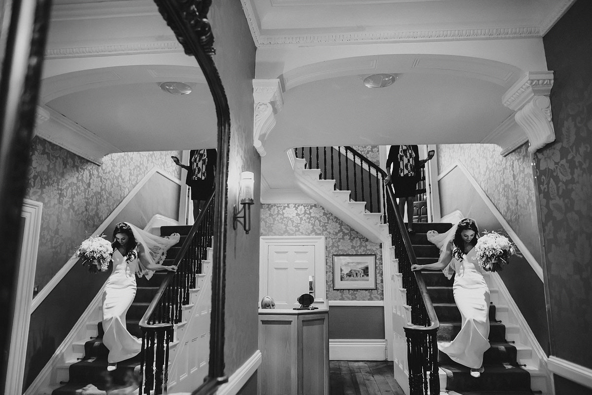 Bride walking down stair at Horn of Plenty